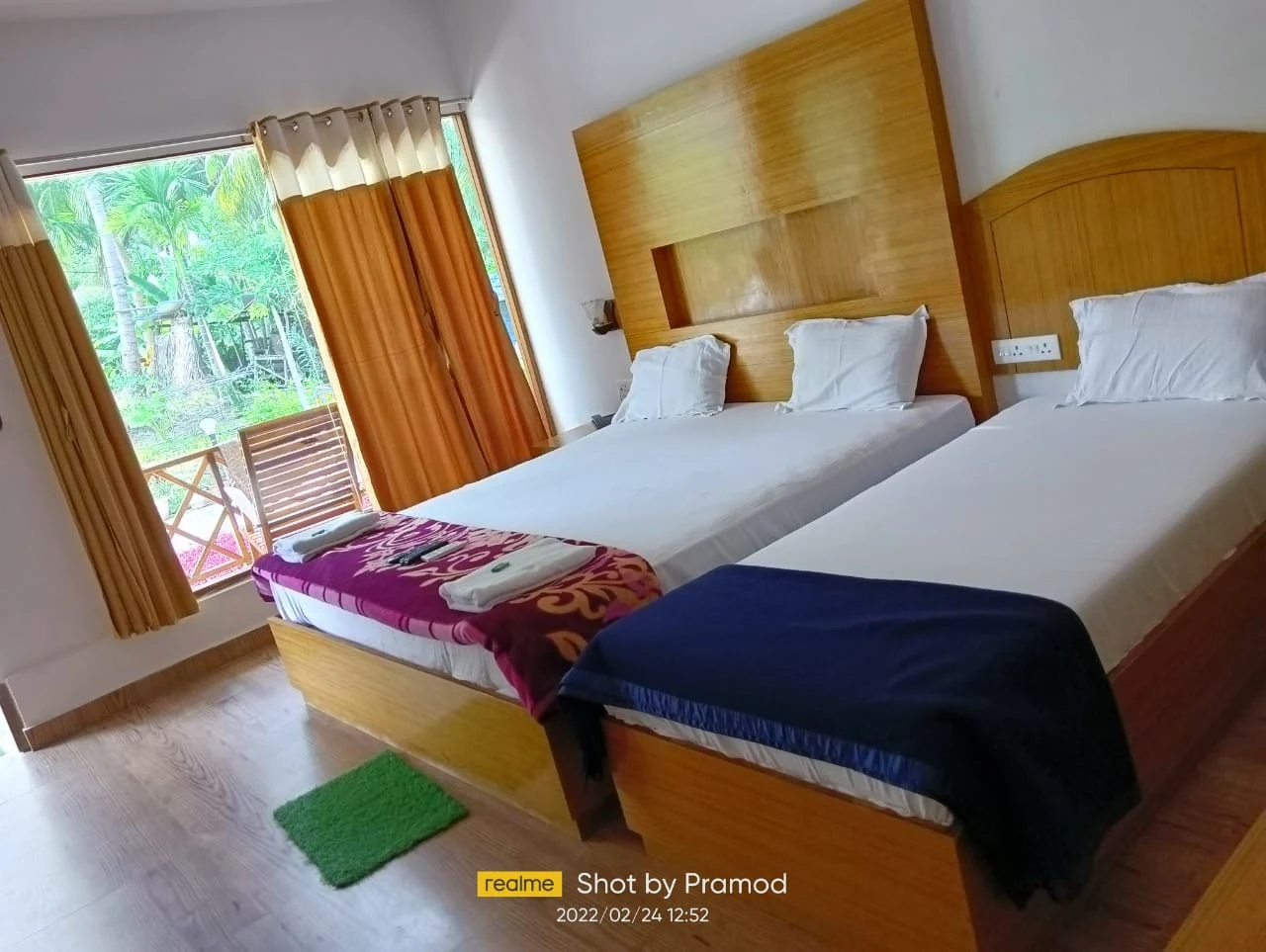 Laxmi Continental Resort room .webp